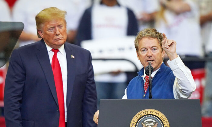 Former President Donald Trump looks on as Sen. Rand Paul (R-Ky.) speaks at a campaign rally at the Rupp Arena in Lexington, Ky., on Nov. 4, 2019. (Bryan Woolston/Getty Images)