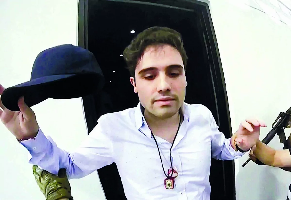 This Oct. 17, 2019, frame grab from video provided by the Mexican government shows Ovidio Guzman at the moment of his detention, in Culiacan, Mexico. (The Canadian Press/CEPROPIE via AP)