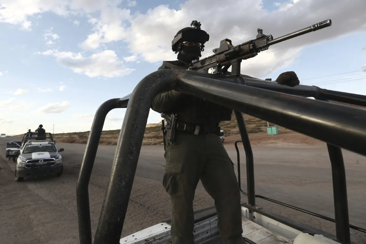 Chihuahua state police officers man a checkpoint in Janos, Chihuahua state, northern Mexico on Nov. 5, 2019. (Christian Chavez/AP Photo)