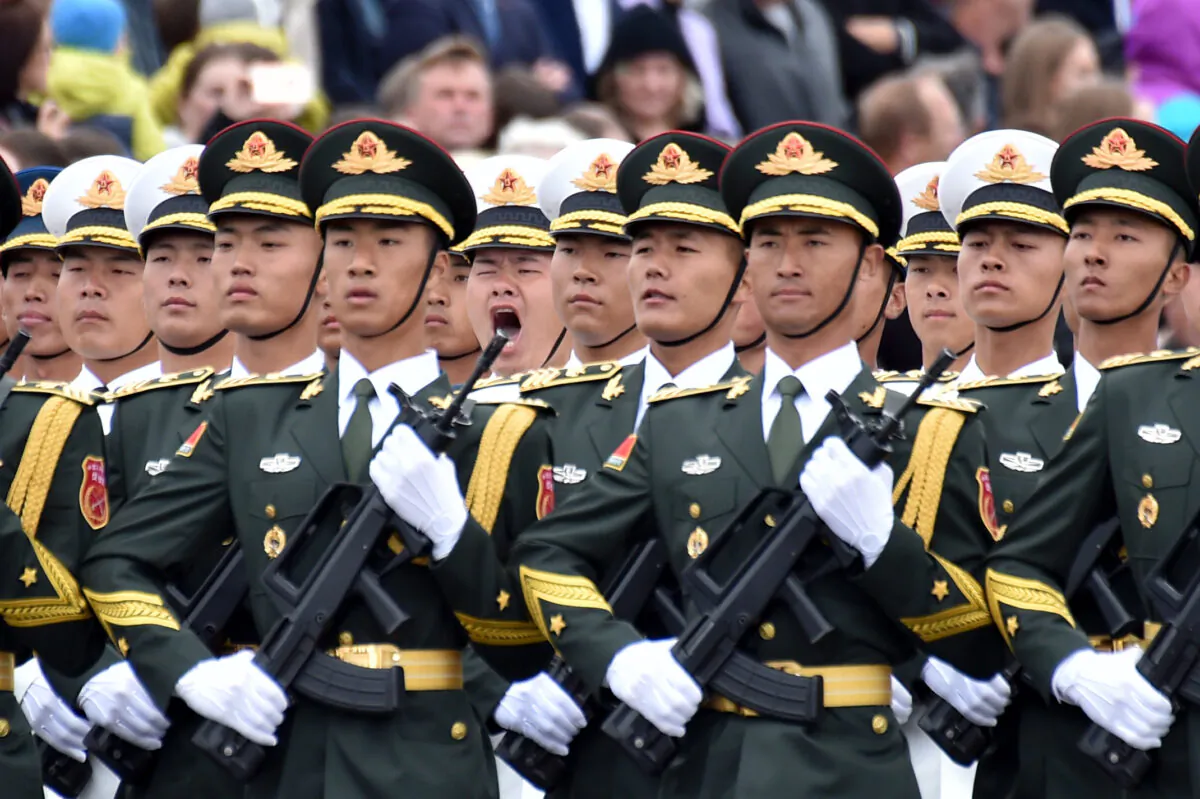 Chinese soldiers march during a military parade in a file photo. (Sergei Gapon/AFP via Getty Images)