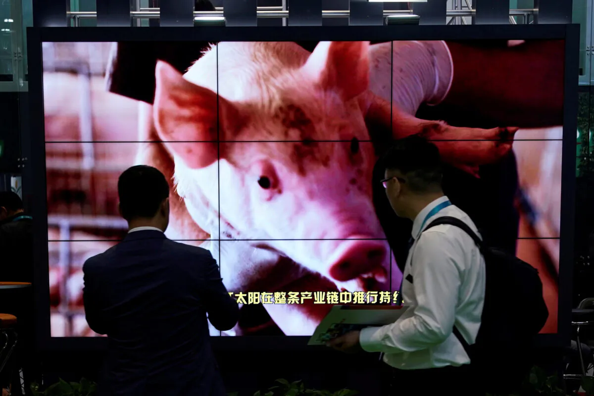 Advertisement of imported pork is seen at the second China International Import Expo (CIIE) in Shanghai, China on Nov. 6, 2019. (Aly Song/Reuters)