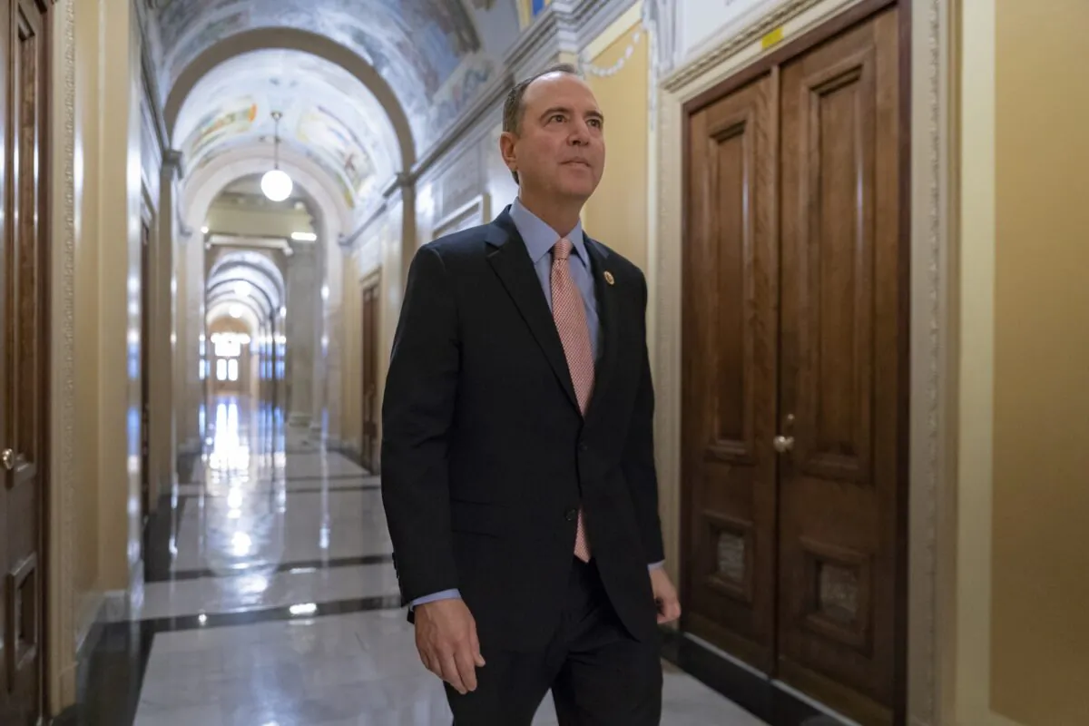 Rep. Adam Schiff (D-Calif.), chairman of the House Intelligence Committee, walks to a secure area at the Capitol to interview a witness in the House impeachment inquiry in Washington on Nov. 6, 2019. (J. Scott Applewhite/AP Photo)