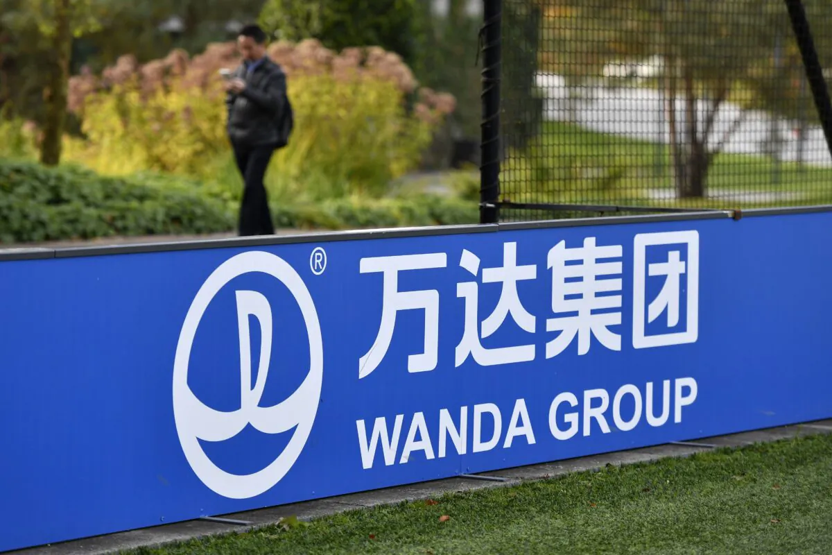 The sign and logo of Wanda Group, a Chinese multinational conglomerate corporation and FIFA partner, is seen at the world football's governing body headquarters in Zurich on Oct. 13, 2016.
(Fabrice Coffrini/AFP via Getty Images)