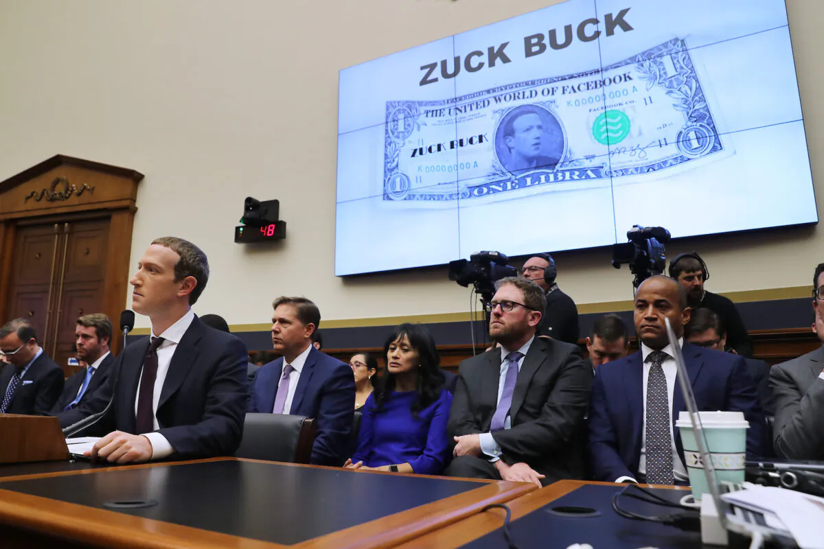 Facebook co-founder and CEO Mark Zuckerberg (L) testifies before the House Financial Services Committee in the Rayburn House Office Building on Capitol Hill, in Washington, on Oct. 23, 2019. (Chip Somodevilla/Getty Images)