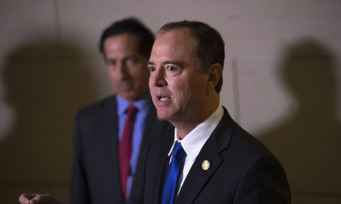 (L-R) Rep. Jamie Raskin (D-Md.) stands next to House Intelligence Committee Chairman Rep. Adam Schiff (D-Calif.) as he speaks to reporters following a closed-door hearing with the House Intelligence, Foreign Affairs and Oversight committees at the U.S. Capitol in Washington on Nov. 4, 2019. (Drew Angerer/Getty Images)