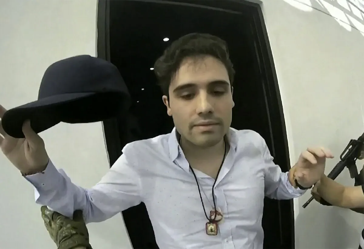 Ovidio Guzman Lopez is being detained in Culiacan, Mexico, on Oct. 17, 2019. (Cepropie via AP)