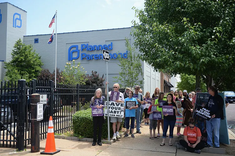 A group of demonstrators display signs during a pro-life rally outside the Planned Parenthood Reproductive Health Center in St Louis on on June 4, 2019. (Michael B. Thomas/Getty Images)