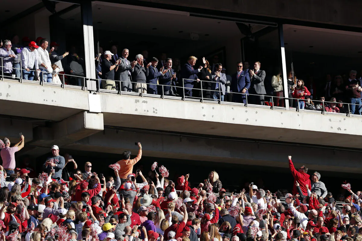 President Donald Trump and first lady Melania Trump attend the game between the LSU Tigers and the Alabama Crimson Tide at Bryant-Denny Stadium on November 09, 2019 in Tuscaloosa, Alabama. (Photo by Kevin C. Cox/Getty Images)