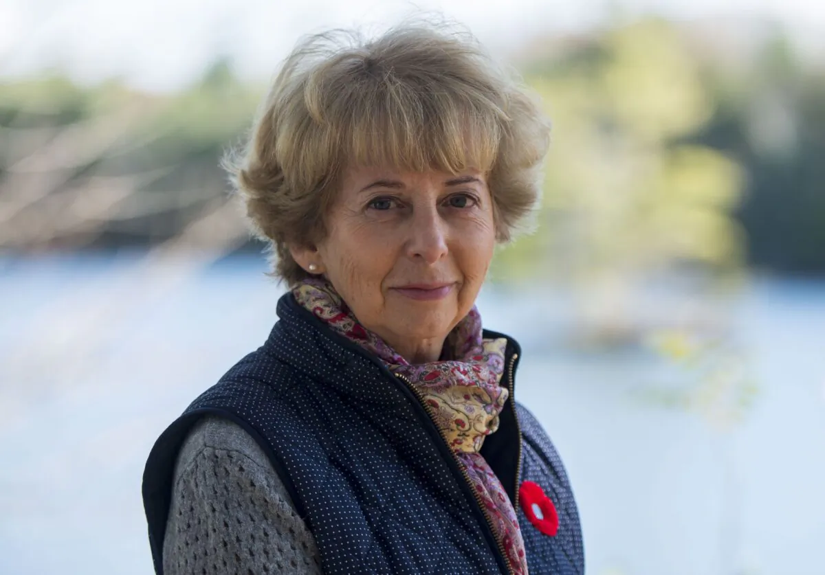 Silver Cross Mother Reine Samson Dawe poses at her home north of Kingston, Ont., on Nov. 6, 2019. Not only did Reine Samson Dawe's husband serve his entire career in the Canadian Armed Forces, but her four sons all followed in his footsteps. Samson Dawe is this year's Silver Cross Mother. (The Canadian Press/Sean Kilpatrick)