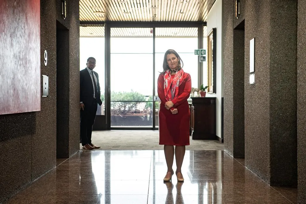 Foreign Affairs Minister Chrystia Freeland waits to greet Rep. Richard Neal, chairman of the U.S. House of Representatives ways and means committee, in Ottawa, on Nov. 6, 2019. Canada is supporting the decision to pursue a genocide prosecution against the Burmese government for supporting the systemic violence that forced more than 700,000 Rohingya Muslims to flee their country. (The Canadian Press/Justin Tang)