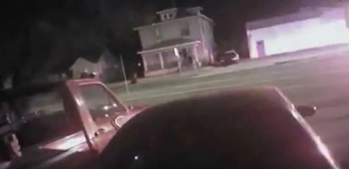 Police officers respond to a house in Wichita, Kansas, in a file image from bodycam footage. (Wichita Police Department)