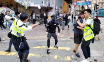 Police Fire Live Rounds at 2 Protesters As Hong Kong Engulfed in Citywide Strike
