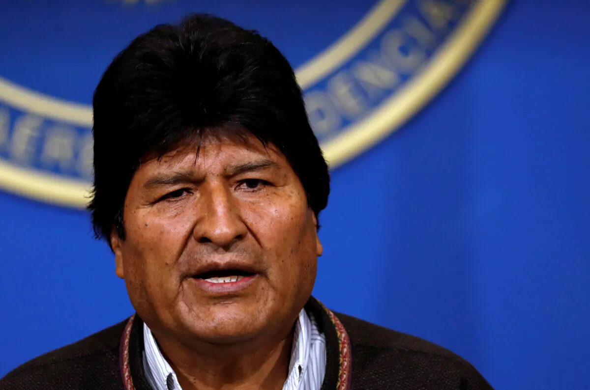 Bolivia's President Evo Morales addresses the media at the presidential hangar in the Bolivian Air Force terminal in El Alto, Bolivia, Nov. 10, 2019. (Carlos Garcia Rawlins/Reuters)