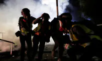 Police Besiege Hong Kong Campus in Nighttime Clashes With Student Protesters