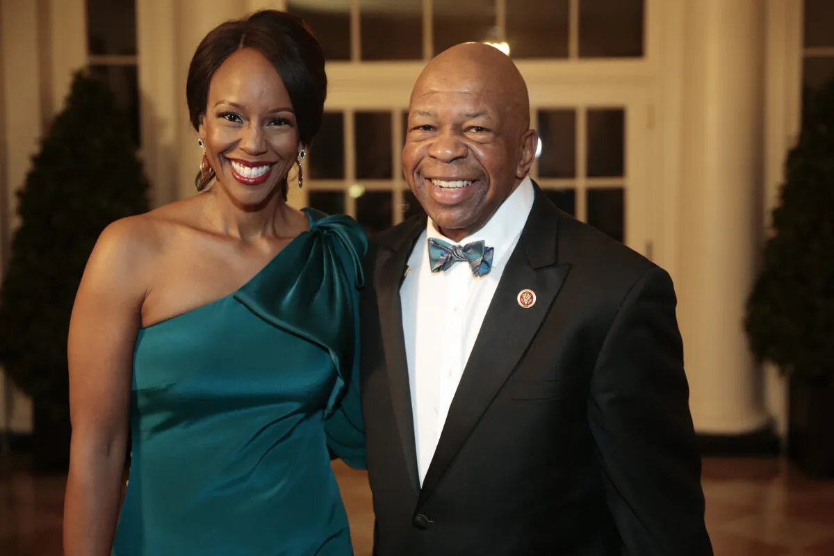 Elijah Cummings and Maya Rockeymoore Cummings at the White House in Washington, on Feb. 11, 2014. (Andrew Harrer-Pool/Getty Images)
