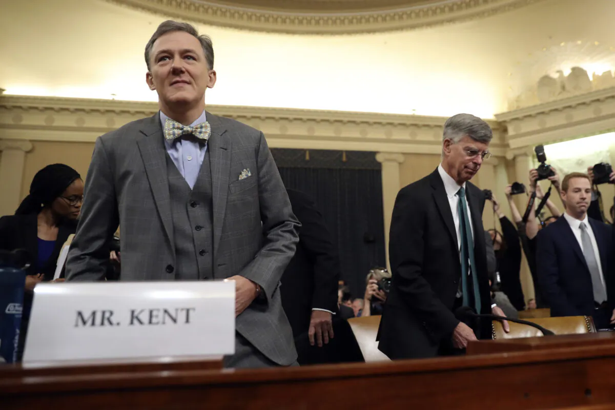 Career Foreign Service officer George Kent and top U.S. diplomat in Ukraine William Taylor arrive to testify before the House Intelligence Committee on Capitol Hill in Washington on Nov. 13, 2019. (AP Photo/Andrew Harnik)