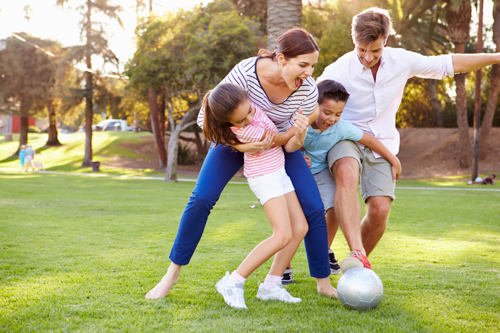 Make time to move your body for increased energy and reduced stress. A great way to get this done is to play an active game with your children.  (Shutterstock)