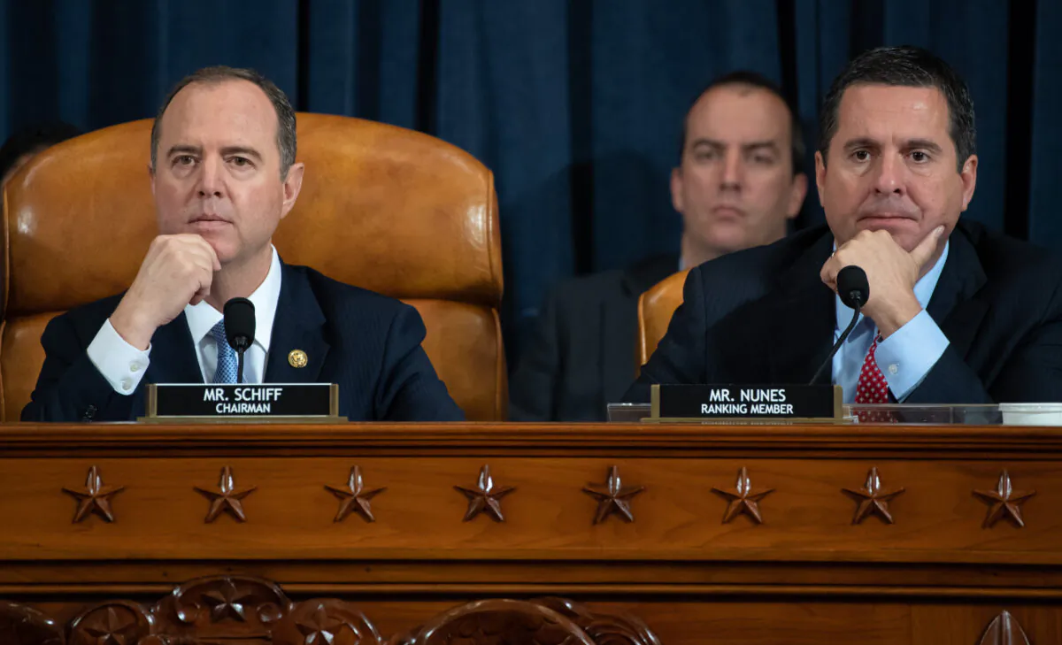 (L-R) House Intelligence Committee Chairman Adam Schiff (D-Calif.) and ranking member of the House Intelligence Committee Devin Nunes (R-Calif.) listen to testimony during the first public hearings held by the House Permanent Select Committee on Intelligence as part of the impeachment inquiry into U.S. President Donald Trump on Capitol Hill in Washington on Nov. 13, 2019. (Saul Loeb - Pool/Getty Images)