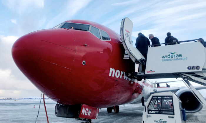 Passengers board a Norwegian Air plane in Kirkenes, Norway Oct. 26, 2019. (Gwladys Fouche/Reuters)