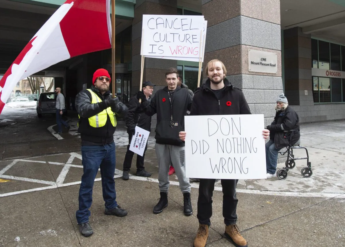 Don Cherry supporters stand outside Rogers head office in Toronto on Nov. 13, 2019. (The Canadian Press/Frank Gunn)
