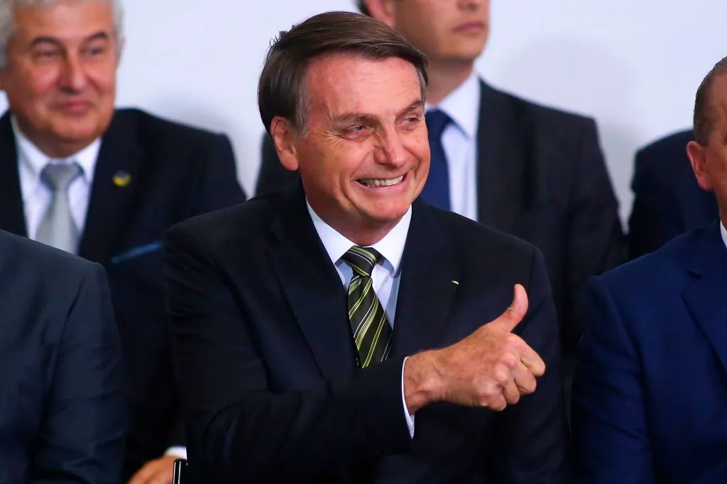 Brazilian President Jair Bolsonaro gestures during a ceremony to commemorate the 300 days of Bolsonaro's administration at Planalto Palace in Brasilia, Brazil, on Nov. 5, 2019. (Sergio Lima/AFP via Getty Images)