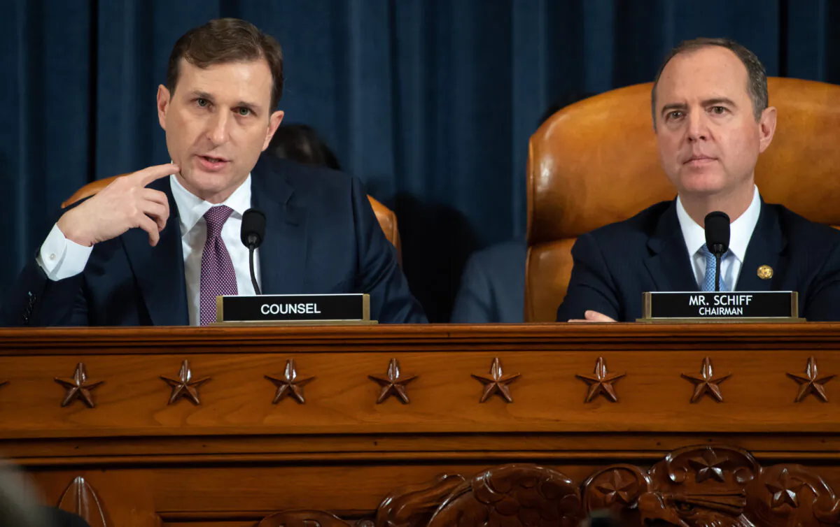 Democratic Counsel Daniel Goldman questions top U.S. diplomat in Ukraine William B. Taylor Jr. as Chairman Adam Schiff (D-CA) listens during the first public hearings held by the House Permanent Select Committee on Intelligence as part of the impeachment inquiry into U.S. President Donald Trump on Capitol Hill in Washington on Nov. 13, 2019. (Saul Loeb - Pool/Getty Images)