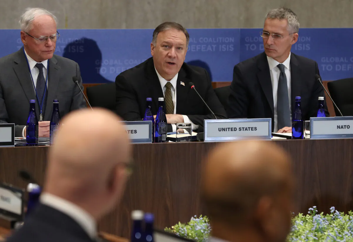 Secretary of State Mike Pompeo (C) speaks during a meeting of the Global Coalition to Defeat ISIS, at the State Department in Washington on Nov. 14, 2019. (Mark Wilson/Getty Images)