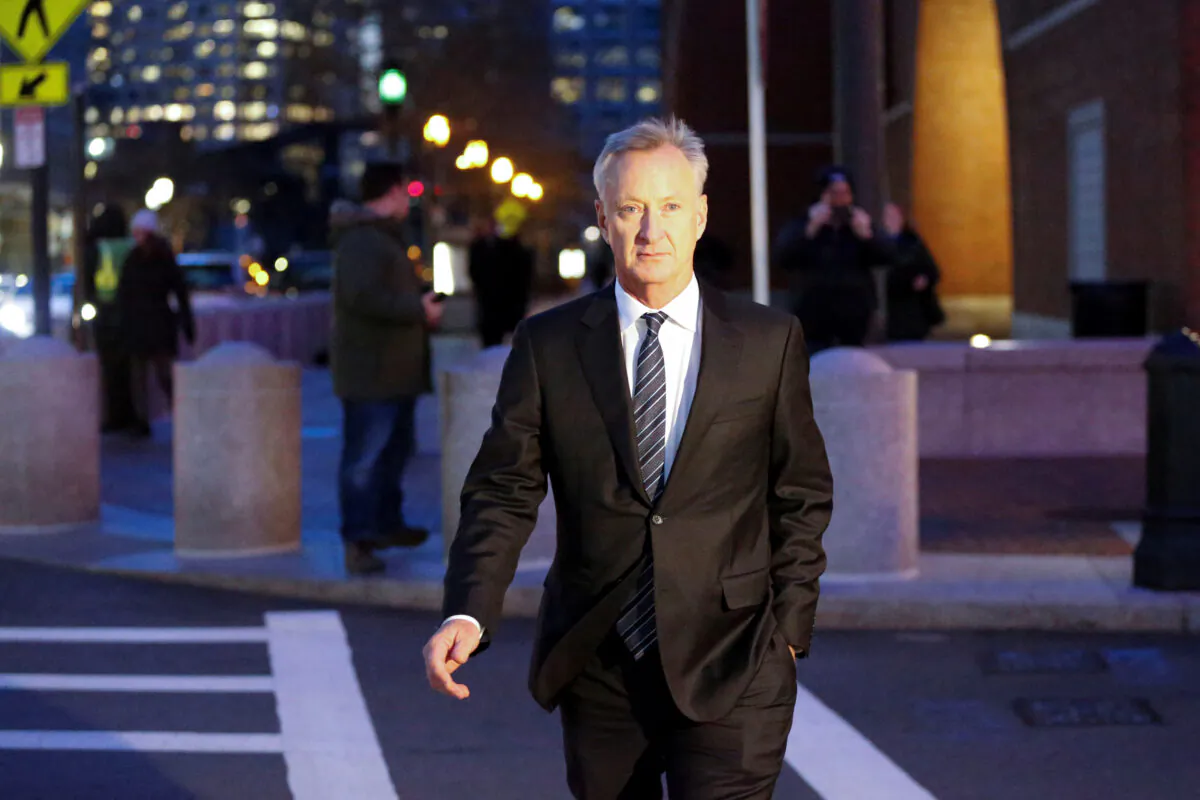 Title insurance executive Toby MacFarlane leaves the federal courthouse after being sentenced in connection with a nationwide college admissions cheating scheme in Boston, Mass., on Nov. 13, 2019. (Katherine Taylor/Reuters)