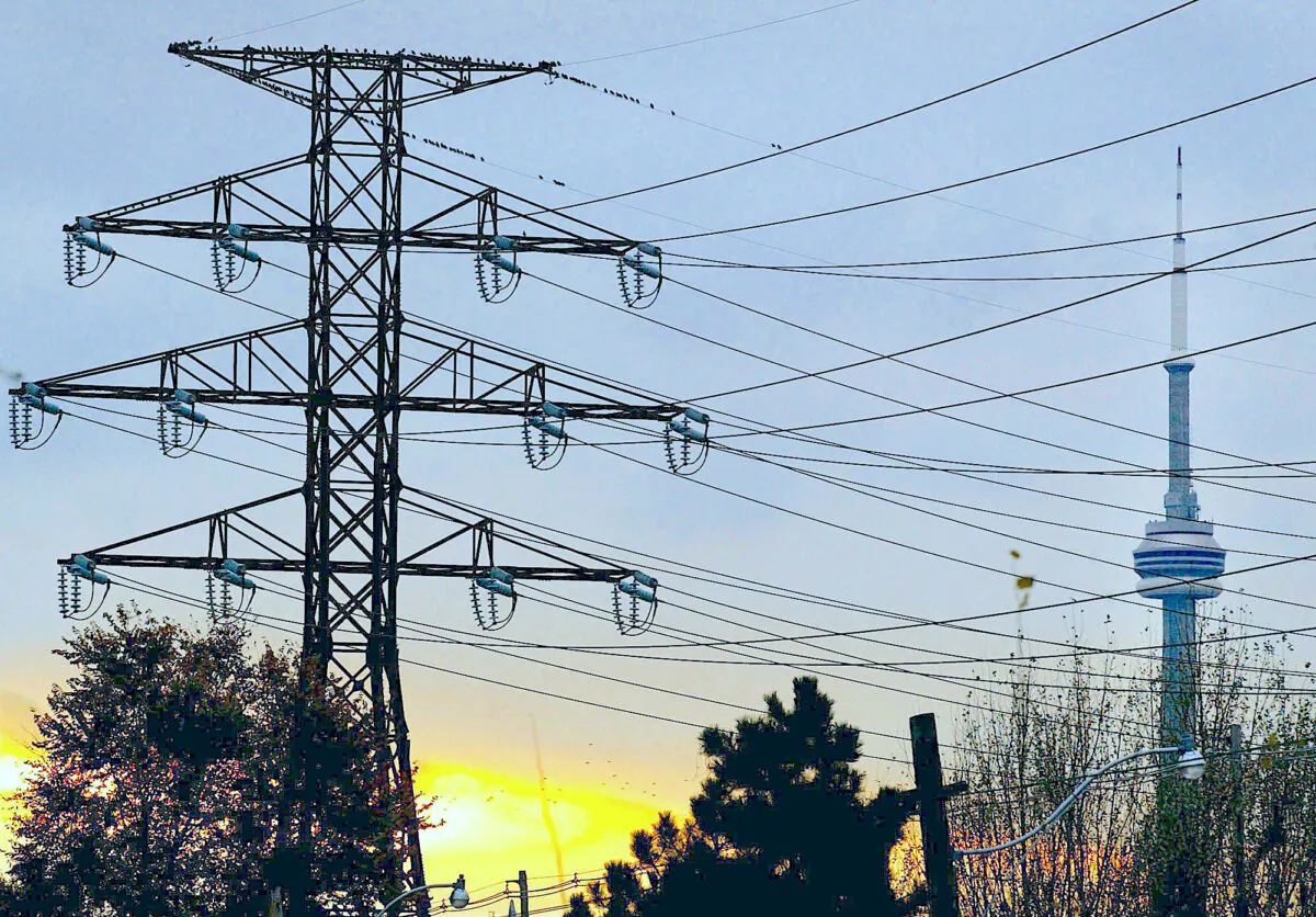 Hydro lines in downtown Toronto with the CN Tower as a backdrop, in a file photo. (CP Photo/Kevin Frayer)
