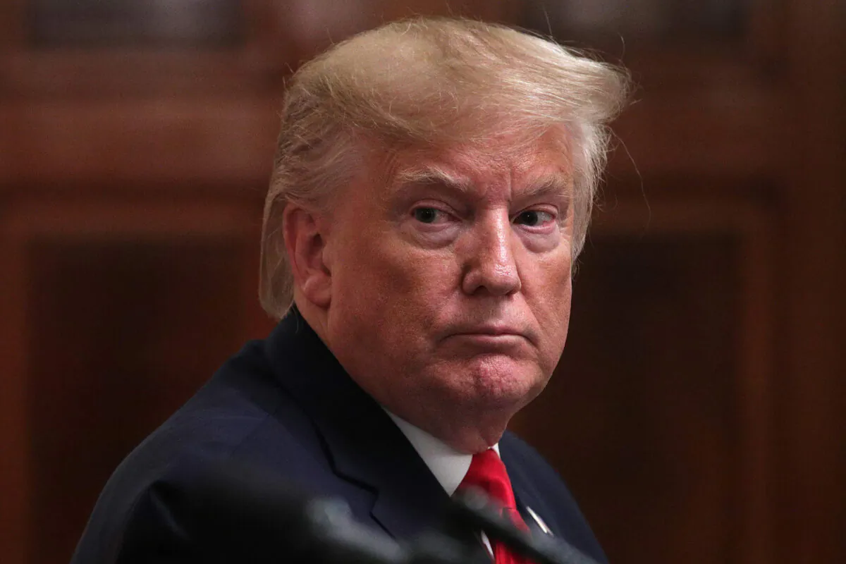 President Donald Trump listens during a news conference in the East Room of the White House in Washington on Nov. 13, 2019. (Alex Wong/Getty Images)
