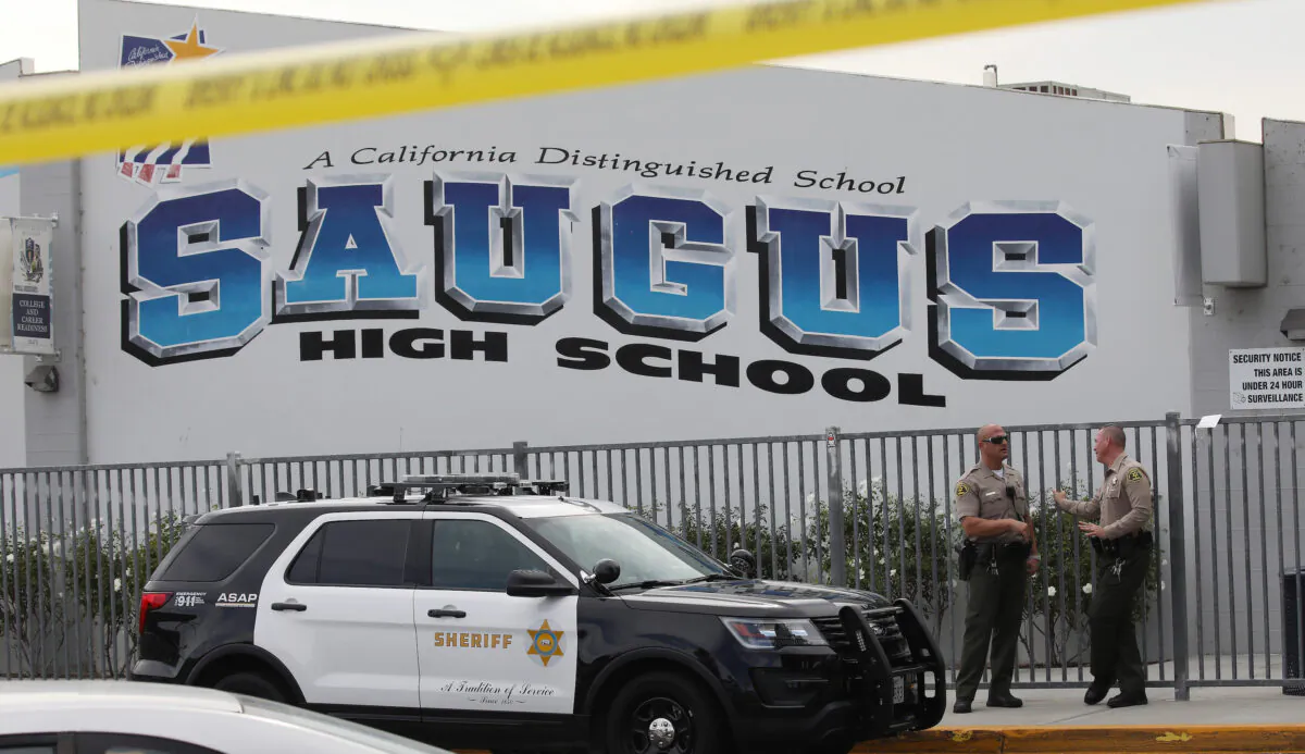 LA County Sheriff's Deputies are positioned at Saugus High School in Santa Clarita, Calif., on Nov. 15, 2019. (Mario Tama/Getty Images)