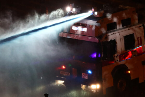 Protesters clash with police outside Hong Kong Polytechnic University (PolyU) in Hong Kong