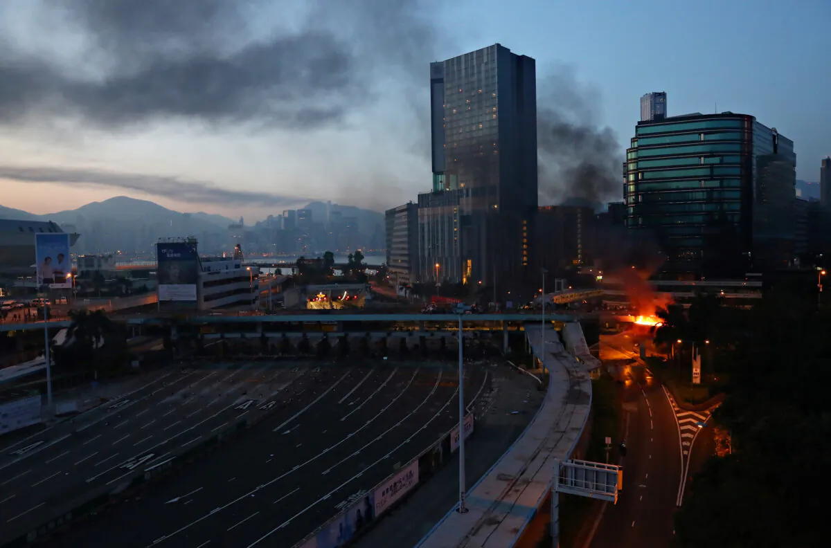 A fire is seen at the Hong Kong Polytechnic University (PolyU) in Hong Kong, on the early morning of November 18, 2019. (REUTERS/Athit Perawongmetha)