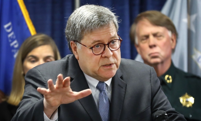 Attorney General William Barr, alongside officials from the Bureau of Alcohol, Tobacco, Firearms and Explosives, announces the launch of Project Guardian, an anti-gun violence initiative, during a news conference, at the Davis-Horton Federal Building in Memphis Tenn., on Nov. 13, 2019. (Mark Weber/Daily Memphian via AP)
