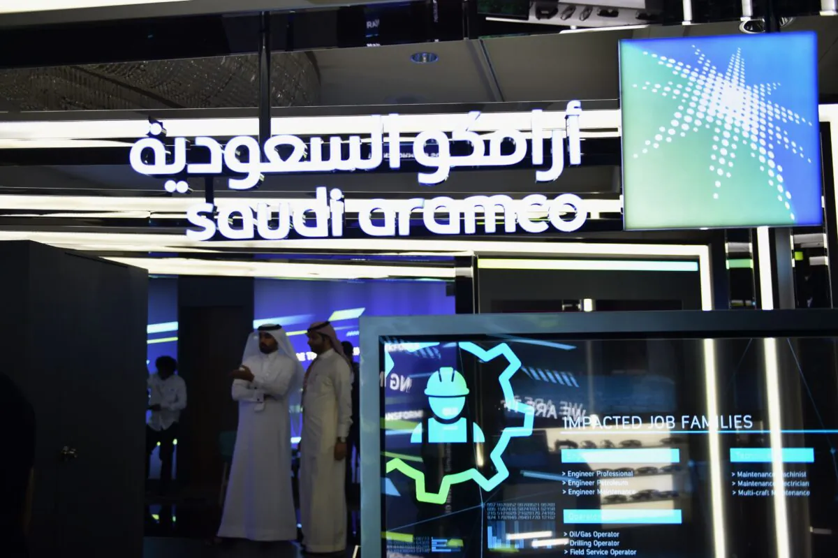 Visitors stop at the Aramco exhibition section at an expo in Riyadh, Saudi Arabia, on Nov. 13, 2019. (Fayez Nureldine/AFP via Getty Images)