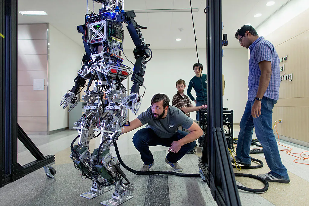 Mechanical engineering students prepare for the Defense Advanced Research Projects Agency Robotics Challenge at Virginia Tech on April 9, 2015. (Chip Somodevilla/Getty Images)