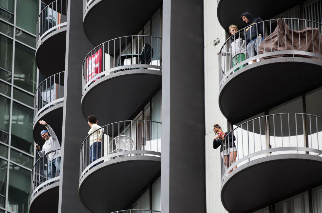 People on a high-rise apartment in Seattle, Washington, on March 24, 2018. (Lindsey Wasson/Getty Images)