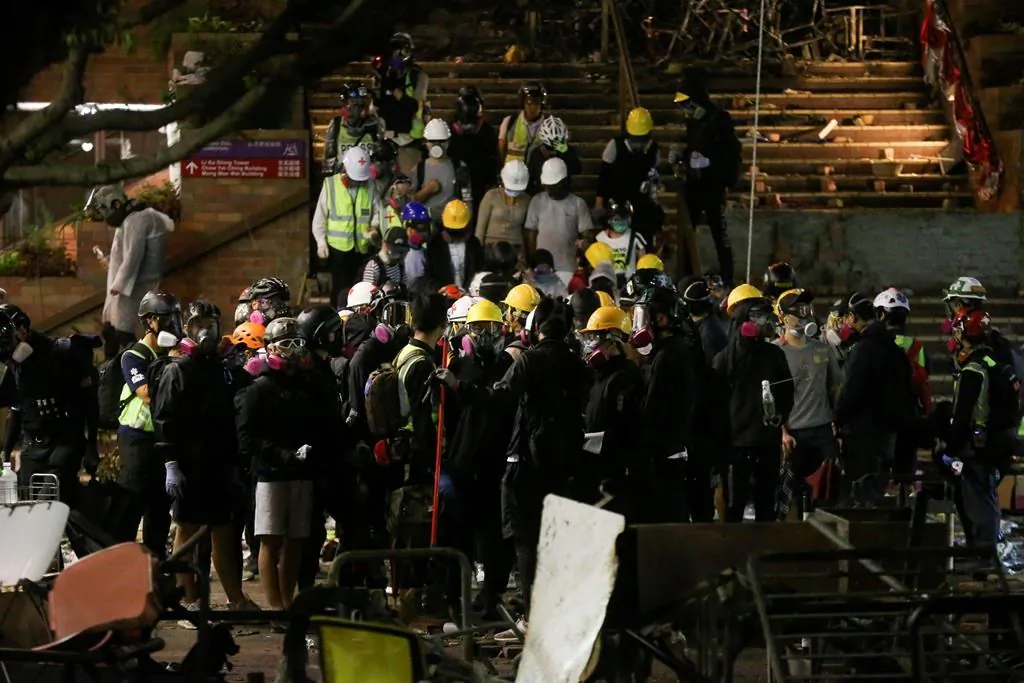 Hong Kong universities have been closing their campuses as violent protests take over. (The Canadian Press)