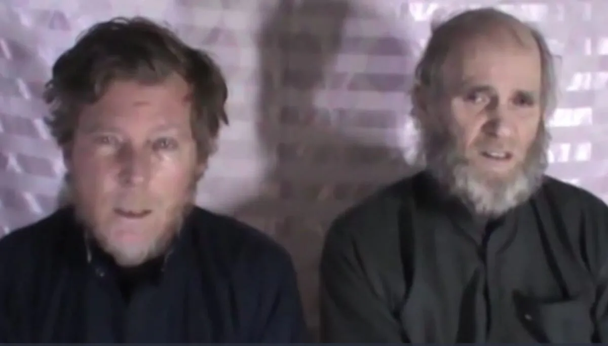 Australian Timothy Weeks (L) and U.S. citizen Kevin King in a still image from a 2017 video released by the Taliban. (Taliban)
