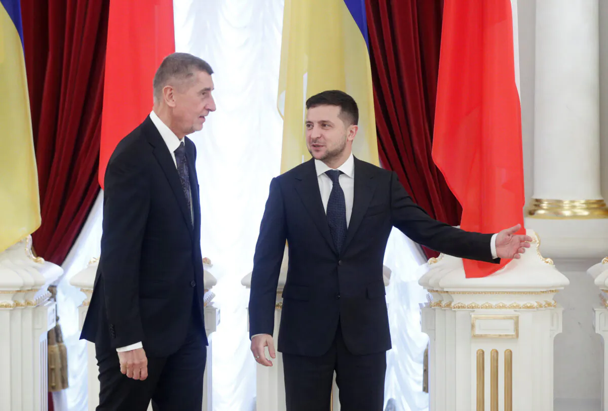 Ukrainian President Volodymyr Zelensky shows the way to Czech Prime Minister Andrej Babis during a meeting in Kiev on Nov. 19, 2019. (Valentyn Ogirenko/Reuters)