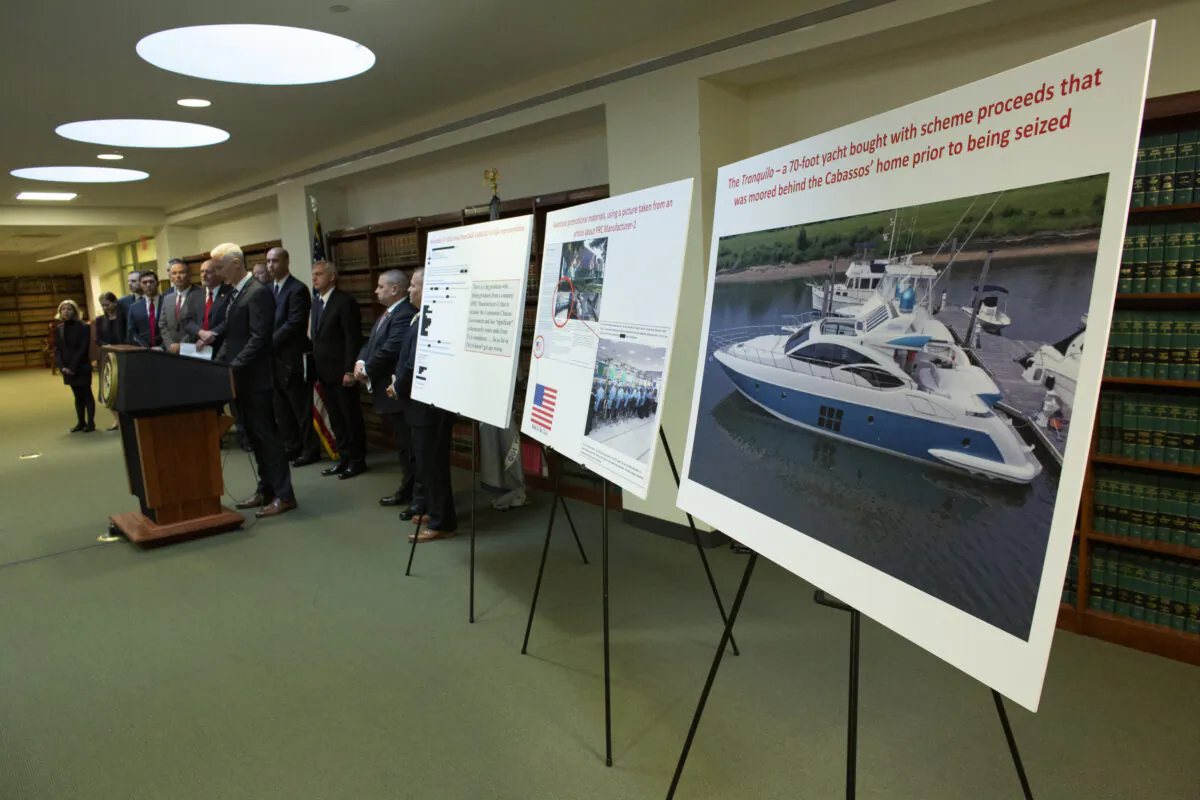 Displays show evidence as the U.S. Attorney for the Eastern District of New York holds a press conference detailing the criminal charges filed against a Long Island tech firm on illegal importation of Chinese surveillance equipment in New York City, U.S. on Nov. 7, 2019. Federal agents raided Aventura Technologies suspected of selling Chinese-made equipment to the U.S. military that it allegedly claimed had been manufactured in the U.S. (Kena Betancur/Getty Images)