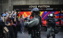 Last Campus Protesters Hold Out as Hong Kong Schools Reopen