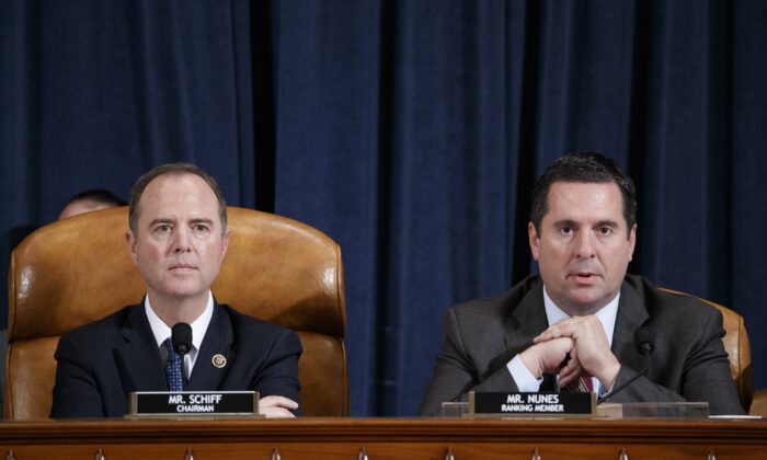 House Intelligence Chairman Adam Schiff (D-Calif.) listens as Ranking Member Rep. Devin Nunes (R-Calif.) speaks at the open impeachment hearing in Washington on Nov. 19, 2019. (Shawn Thew - Pool/Getty Images)
