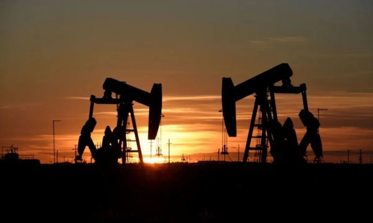 Pump jacks operate at sunset in an oilfield in Midland, Texas, on Aug. 22, 2018. (Reuters/Nick Oxford)