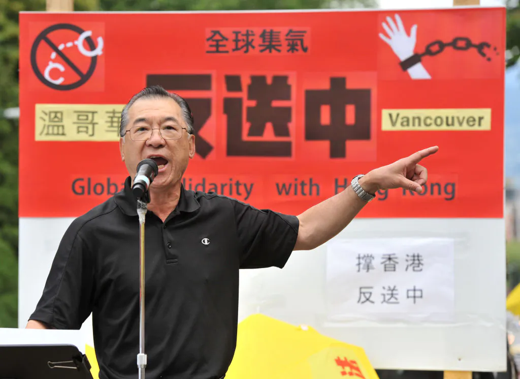 Rally organizer Kenneth Tung addresses demonstrators gathered in front of the Chinese Consulate in Vancouver  in support of pro-democracy protesters in Hong Kong on June 9, 2019.  (Don MacKinnon/AFP via Getty Image)