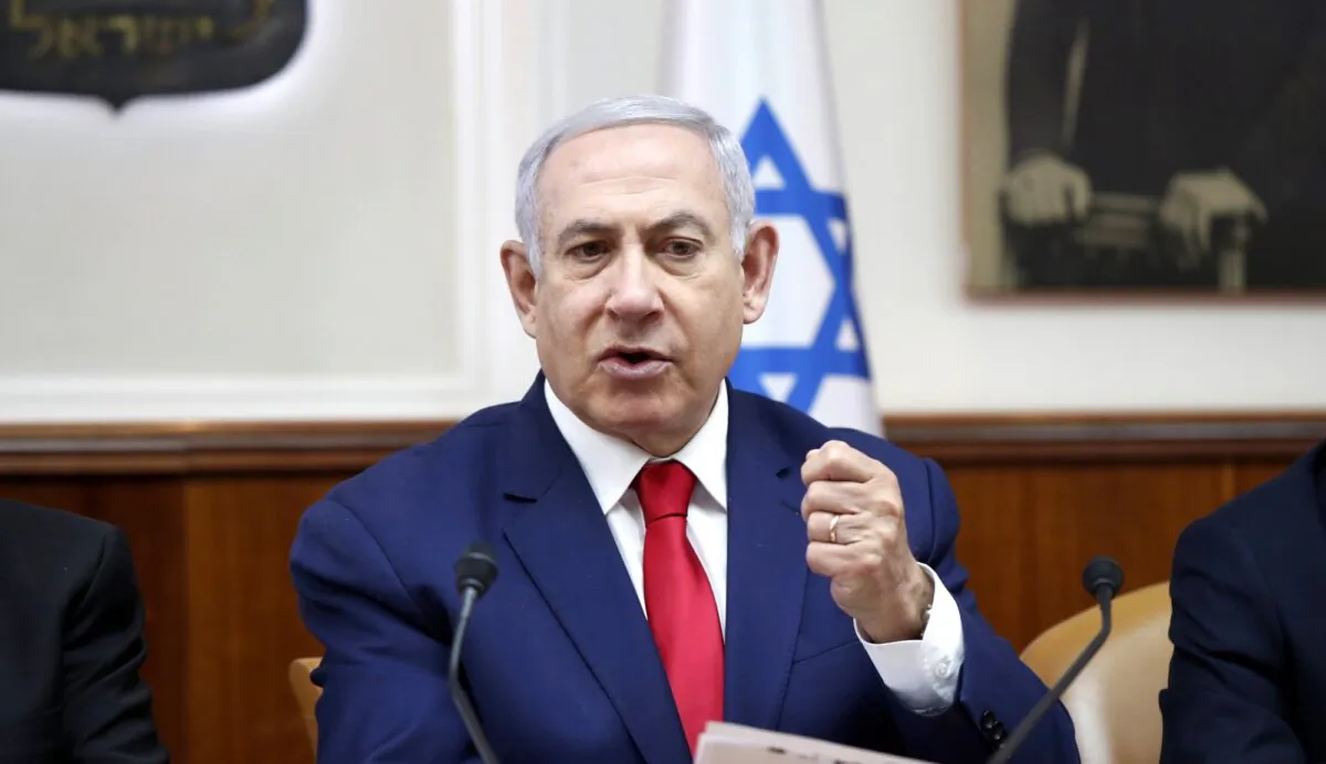 Israeli Prime Minister Benjamin Netanyahu chairs the weekly cabinet meeting in Jerusalem, on April 14, 2019. (Ronen Zvulun/Pool via AP)