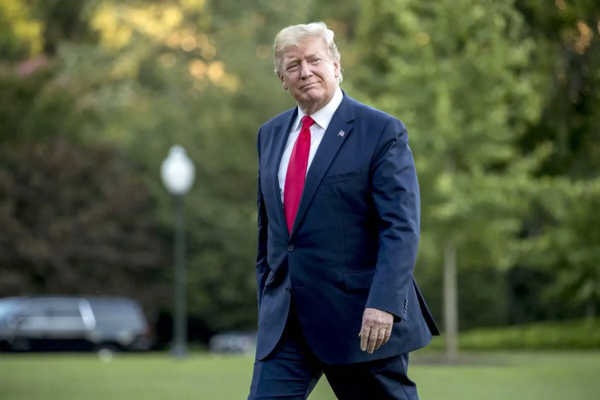 President Donald Trump walks across the South Lawn as he arrives at the White House on June 30, 2019. (Andrew Harnik/AP Photo)