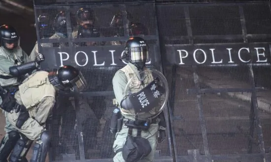 Democracy Group ‘Shocked’ That Hong Kong Cops Were Granted Visas to Attend Police Games in Winnipeg
