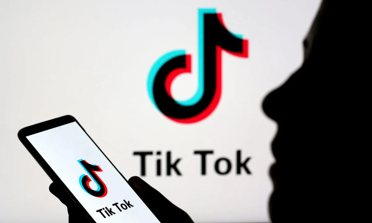 A person holds a smartphone with TikTok logo displayed in this picture illustration taken on Nov. 7, 2019. (Dado Ruvic/Illustration/Reuters)