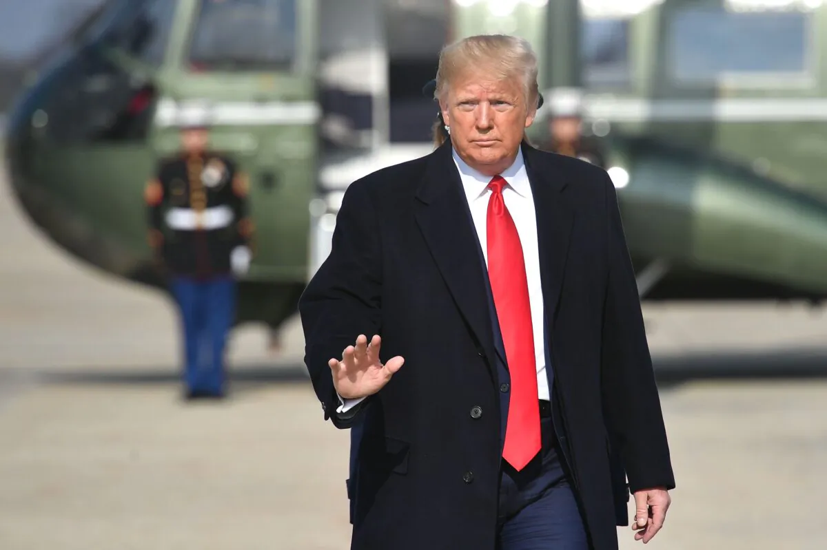 President Donald Trump makes his way to board Air Force One before departing from Andrews Air Force Base in Maryland on Nov. 20, 2019.  (Mandel Ngan/AFP via Getty Images)